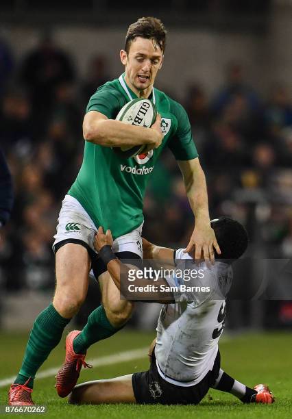 Dublin , Ireland - 18 November 2017; Darren Sweetnam of Ireland is tackled by Henry Seniloli of Fiji during the Guinness Series International match...