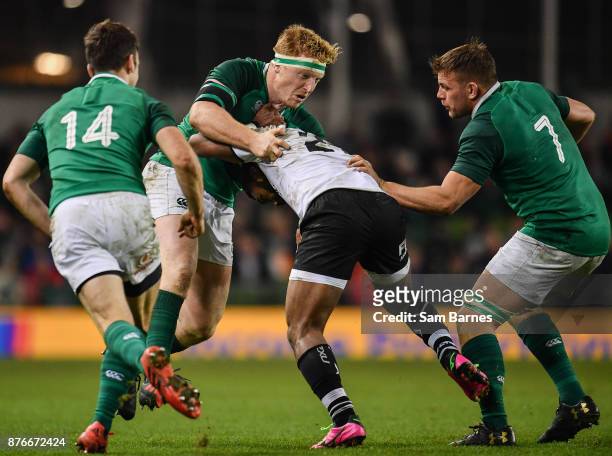 Dublin , Ireland - 18 November 2017; Talemaitoga Tuapati of Fiji is tackled by James Tracy of Ireland during the Guinness Series International match...