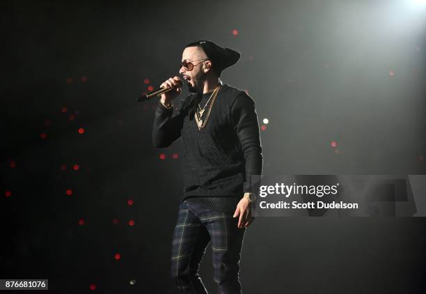 Singer Yandel performs onstage during Uforia's "K-Love Live" concert at The Forum on November 19, 2017 in Inglewood, California.