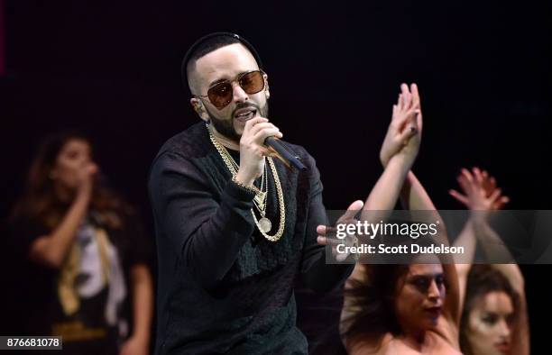 Singer Yandel performs onstage during Uforia's "K-Love Live" concert at The Forum on November 19, 2017 in Inglewood, California.