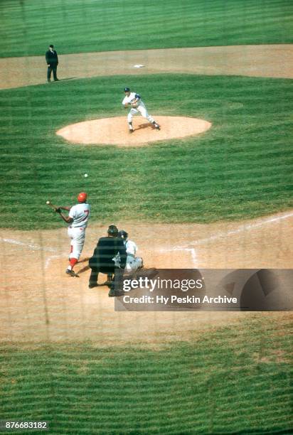 Pitcher Sandy Koufax of the Los Angeles Dodgers throws the pitch as Pancho Herrera of the Philadelphia Phillies swings at the pitch as catcher John...