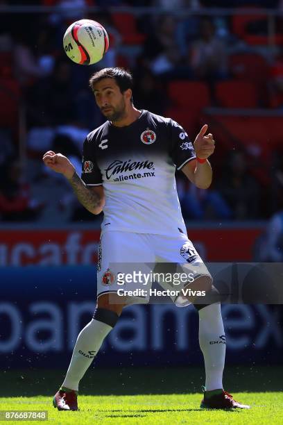 Alejandro Donatti of Tijuana heads the ball during the 17th round match between Toluca and Tijuana as part of the Torneo Apertura 2017 Liga MX at...