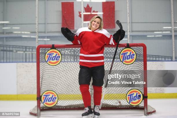 Team Canada captain Marie-Philip Poulin poses for pictures while doing a promo for Tide detergent at Leaside Memorial Arena.