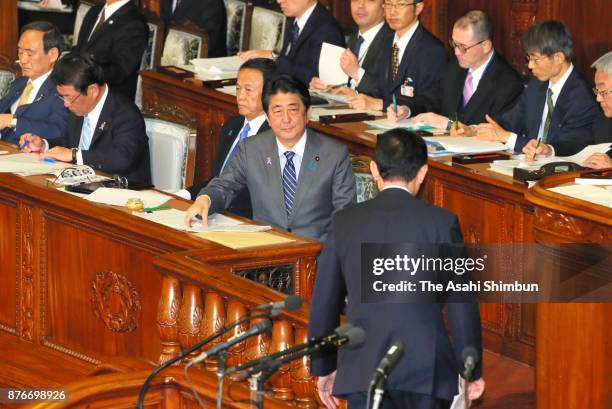 Prime Minister Shinzo Abe is seen prior to responding to the question by Liberal Democratic Party Policy Research Chief Fumio Kishida addresses...