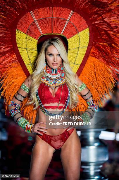 South African model Candice Swanepoel presents a creation during the 2017 Victoria's Secret Fashion Show in Shanghai on November 20, 2017. / AFP...