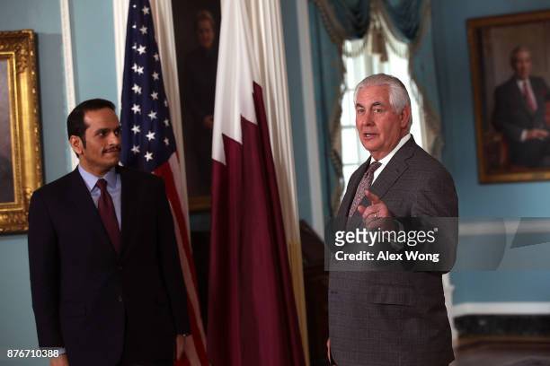 Secretary of State Rex Tillerson speaks as he participates in a photo opportunity with Qatari Foreign Minister Sheikh Mohammed bin Abdulrahman Al...