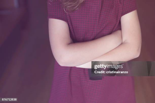 little girl with arms crossed - meter stick stock pictures, royalty-free photos & images
