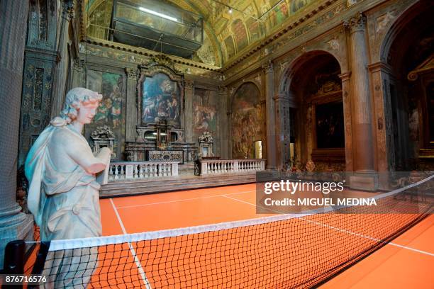 Picture taken on November 20, 2017 shows US artist Asad Raza's new piece of art, a tennis court, called "untitled " inside the San Paolo Converso...