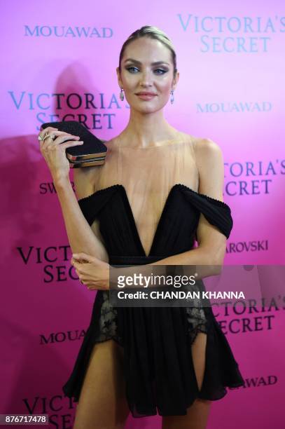 South African model Candice Swanepoel poses as she arrives for the after party of the 2017 Victoria's Secret Fashion Show in Shanghai on November 20,...