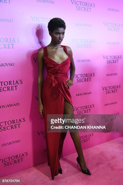 Angolan model Amilna Estevao poses as she arrives for the after party for the 2017 Victoria's Secret Fashion Show in Shanghai on November 20, 2017. /...