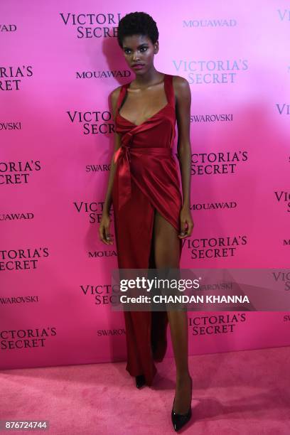 Angolan model Amilna Estevao poses as she arrives for the after party for the 2017 Victoria's Secret Fashion Show in Shanghai on November 20, 2017. /...
