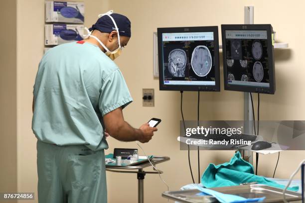 Dr. Sunit Das listens to music while doing surgeries in the operating room. He says that the music allows him to remain in the moment at all times....