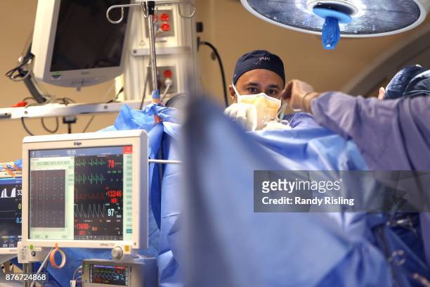 Dr. Sunit Das listens to music while doing surgeries in the operating room. He says that the music allows him to remain in the moment at all times....