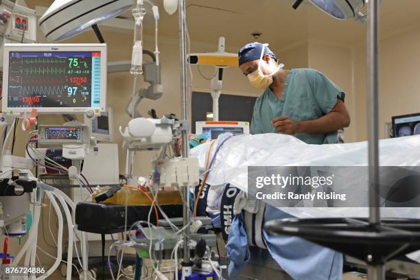 Dr. Sunit Das listens to music while doing surgeries in the operating room. He says that the music allows him to remain in the moment at all times....