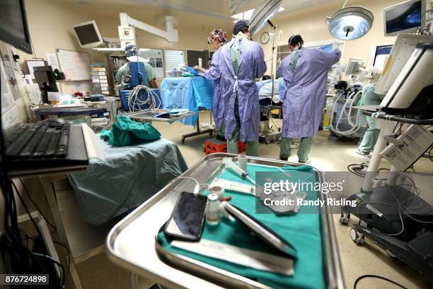 Dr. Sunit Das listens to music while doing surgeries in the operating room. He says that the music allows him to remain in the moment at all times....