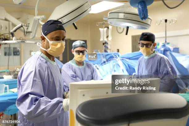 Dr. Sunit Das listens to music while doing surgeries in the operating room. He says that the music allows him to remain in the moment at all times....