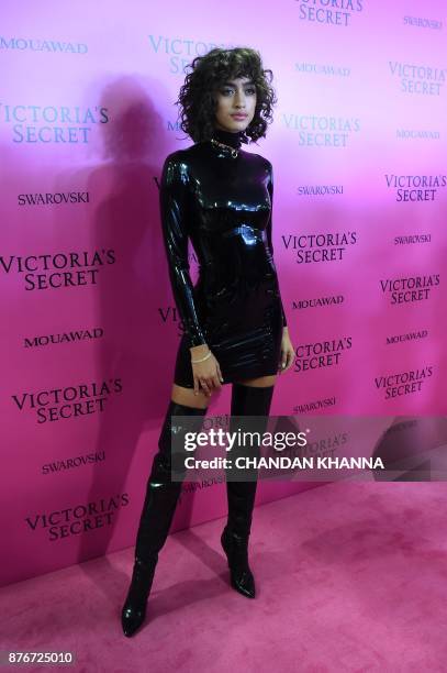 Model Alanna Arrington poses as she arrives for the after party for the 2017 Victoria's Secret Fashion Show in Shanghai on November 20, 2017. / AFP...