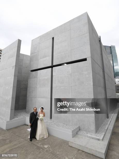 Wedding ceremony is held at a reproduction of Tadao Ando's "Church of the Light," at the National Art Center on November 19, 2017 in Tokyo, Japan....