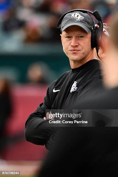 Head coach Scott Frost of the UCF Knights looks on from the sidelines against the Temple Owls during the second quarter at Lincoln Financial Field on...