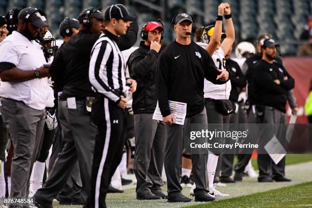 Head coach Scott Frost of the UCF Knights looks on against the Temple Owls during the fourth quarter at Lincoln Financial Field on November 18, 2017...