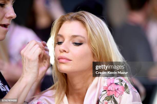 Model Devon Windsor prepares backstage during 2017 Victoria's Secret Fashion Show In Shanghai at Mercedes-Benz Arena on November 20, 2017 in...