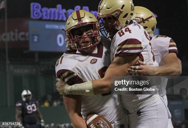 Boston College Eagles tight end Chris Garrison and Boston College Eagles tight end Jake Burt celebrate Garrison's touchdown reception for a 7-3 lead...