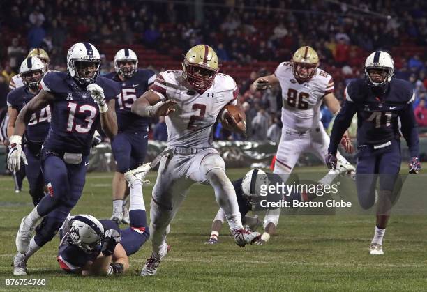 Boston College Eagles running back AJ Dillon high steps his way to the end zone for a 33-3 lead on his run for a touchdown. Boston College faces the...