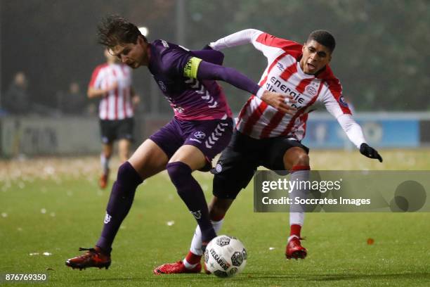 Maarten Peijnenburg of FC Utrecht U23, Laros Duarte of PSV U23 during the Dutch Jupiler League match between PSV U23 v Utrecht U23 at the De Herdgang...