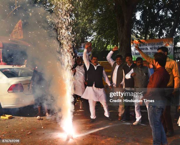Congress worker celebrating after the announcement of Election of Congress President as approved by the Congress Working Committee at AICC HQ on...