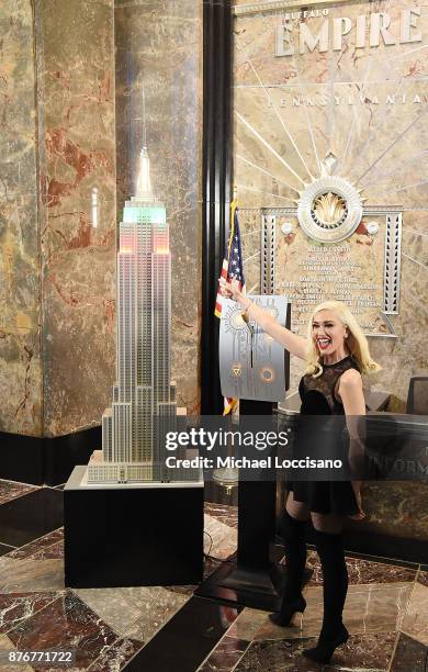 Singer Gwen Stefani lights The Empire State Building to promote The Holiday Light Show at The Empire State Building on November 20, 2017 in New York...