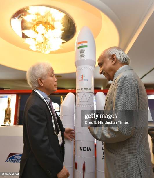 Kiran Kumar, Secy. Department of Space, Chairman - ISRO and Space Commission along with Japanese official and others at the exhibition during the...