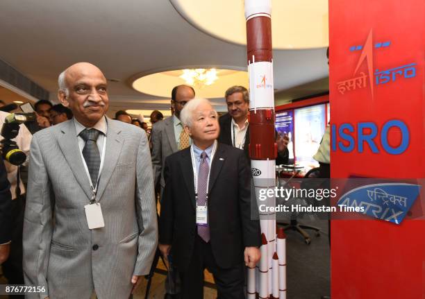 Kiran Kumar, Secy. Department of Space, Chairman - ISRO and Space Commission along with Japanese official and others at the exhibition during the...