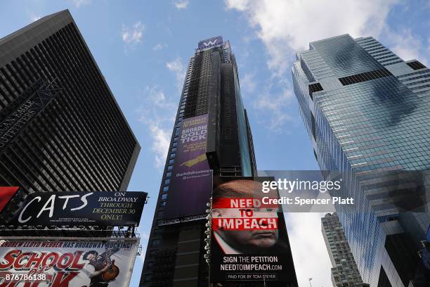 Billboard in Times Square, funded by Philanthropist Tom Steyer, calls for the impeachment of President Donald Trump on November 20, 2017 in New York...