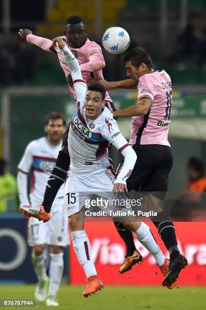 Giacomo Caccin of Cittadella and Carlos Embalo and Ivaylo Chochev of Palermo jump for a header during the Serie B match between US Citta' di Palermo...