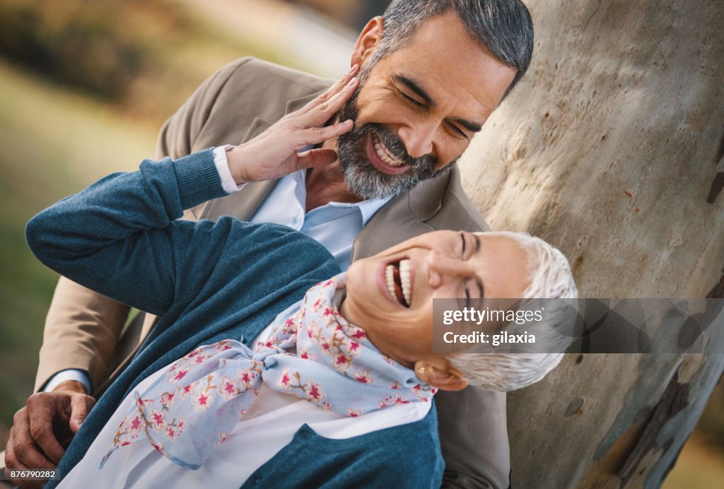 Mid aged couple in a park