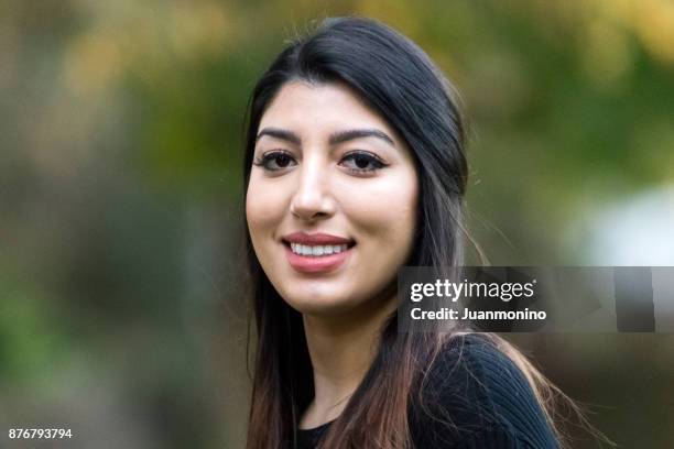 smiling young woman - israeli ethnicity stock pictures, royalty-free photos & images