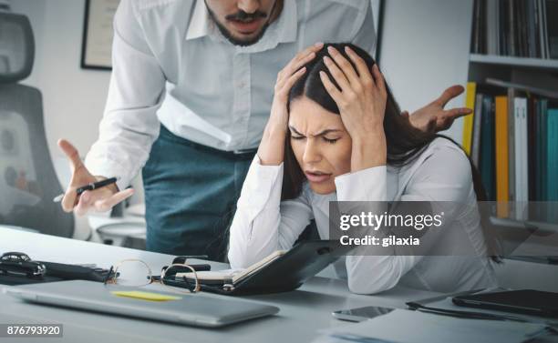 stress at work. - bad employee stock pictures, royalty-free photos & images