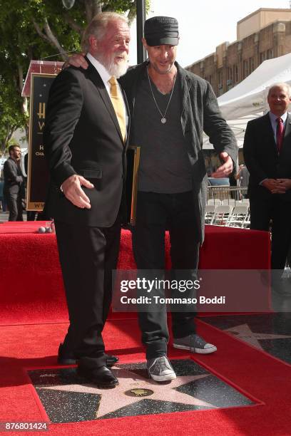 Actor Nick Nolte and director Gavin OConnor attend a ceremony honoring Actor Nick Nolte with Star On The Hollywood Walk Of Fame on November 20, 2017...