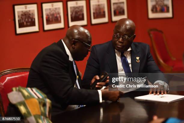 The President of Ghana, Nana Akufo-Addo reads through his notes before delivering his speech to The Cambridge Union on November 20, 2017 in...