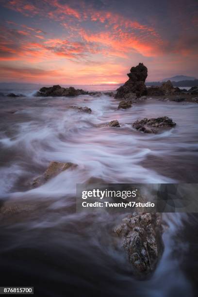 seascape at sunset taken with long exposure to make slow movement - photographer seascape stock pictures, royalty-free photos & images