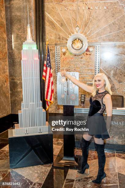 Gwen Stefani lights The Empire State Building to promote The Holiday Light Show at The Empire State Building on November 20, 2017 in New York City.