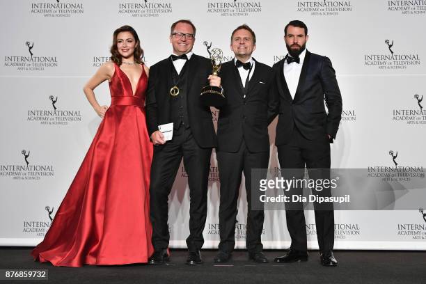 Italia Ricci, Gjermund Stenberg Eriksen, and Vegard Stenberg Eriksen of Mammon II, and Tom Cullen pose with award for Drama Series at the 45th...
