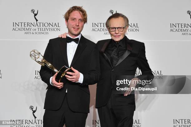 James Bluemel of the documentary Exodus: Our Journey to Europe poses with award and presenter Larry King at the 45th International Emmy Awards at New...