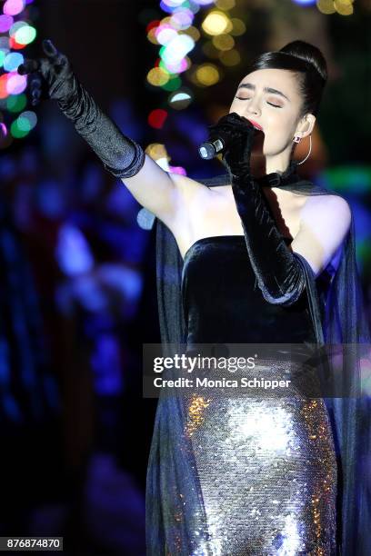 Actress and singer Sofia Carson performs during the 2017 Saks Fifth Avenue Holiday Window Unveiling And Light Show at Saks Fifth Avenue on November...