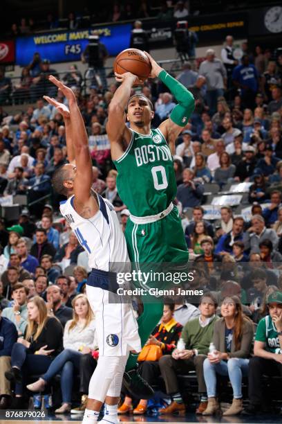 Jayson Tatum of the Boston Celtics shoots the ball during the game against the Dallas Mavericks on November 20, 2017 at the American Airlines Center...