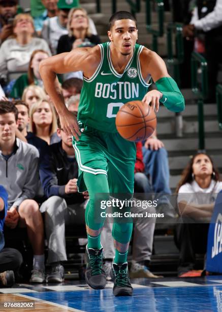 Jayson Tatum of the Boston Celtics handles the ball during the game against the Dallas Mavericks on November 20, 2017 at the American Airlines Center...