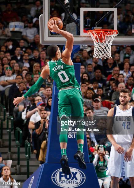 Jayson Tatum of the Boston Celtics dunks the ball during the game against the Dallas Mavericks on November 20, 2017 at the American Airlines Center...