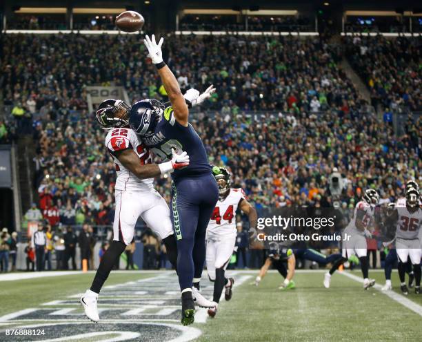Tight end Jimmy Graham of the Seattle Seahawks can't bring in a pass in the end zone against strong safety Keanu Neal of the Atlanta Falcons during...