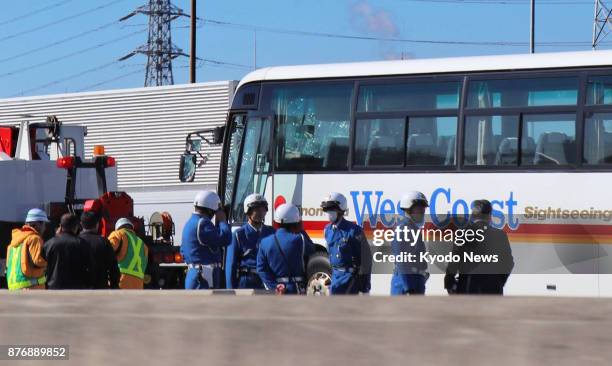 Bus damaged in a pileup is seen on an expressway in Ichikawa, Chiba Prefecture near Tokyo on Nov. 21, 2017. Twenty-three people, including 17 junior...