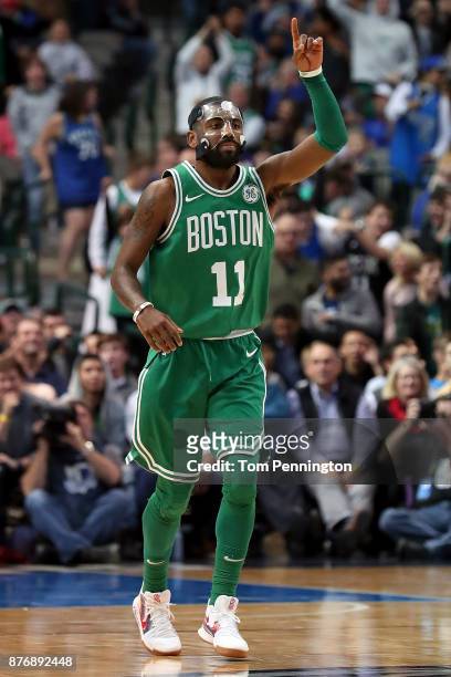 Kyrie Irving of the Boston Celtics celebrates against the Dallas Mavericks at American Airlines Center on November 20, 2017 in Dallas, Texas. NOTE TO...